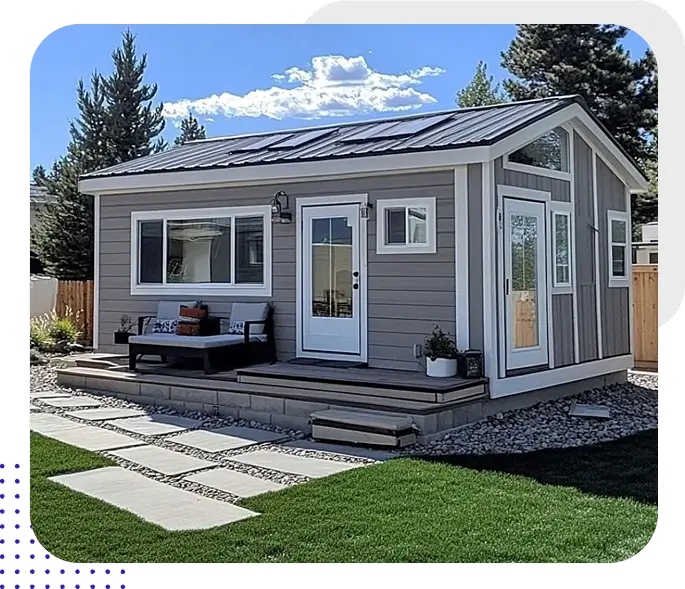 Small modern house with solar panels, garden.